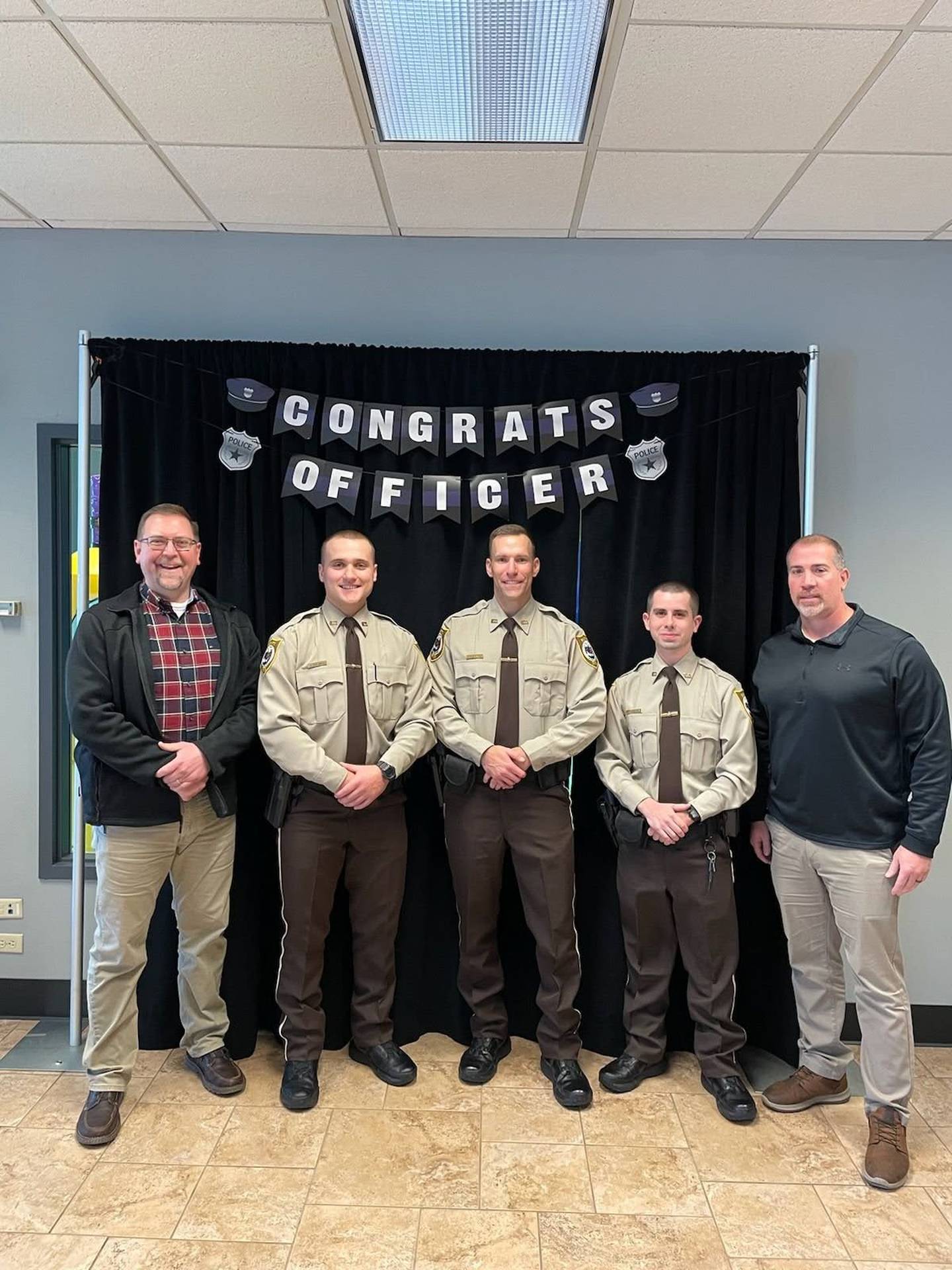 (Left) La Salle County Sheriff Adam Diss and (right) Undersheriff Jason Martin welcome new deputies Jakob Mitchell, Joshua Alexander and Carter Chiaventone. These officers graduated from the MCLETC on Dec. 20, completing a training program that equipped them with the skills needed to serve and protect the community.