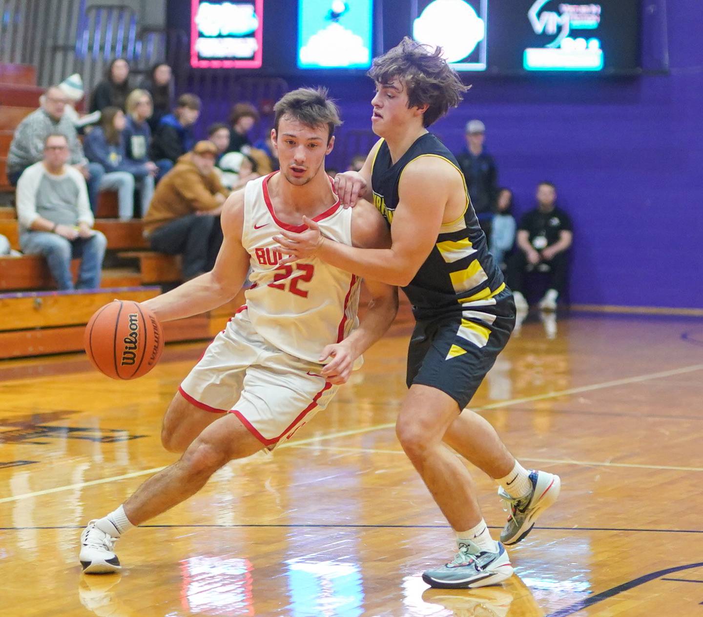 Streator's Christian Benning (22) drives to the hoop against Yorkville Christian's Sam Painter (14) during the 60th annual Plano Christmas Basketball Tournament Plano High School on Wednesday, Dec 27, 2023.