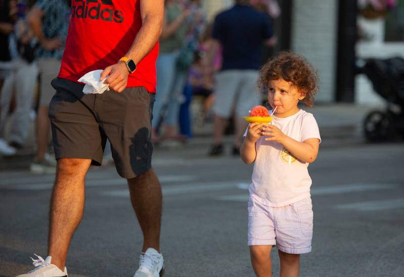 Mara Rezko, 3, enjoys a snow cone at The Taste of Westmont on Saturday, July 13.

Suzanne Tennant/For Shaw Local News Media