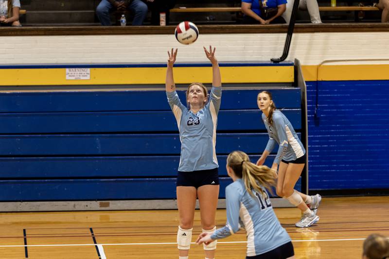 Plainfield South's Grace Malek sets-up a teammate during a varsity volleyball away game against Joliet Central on Sept. 18, 2025.