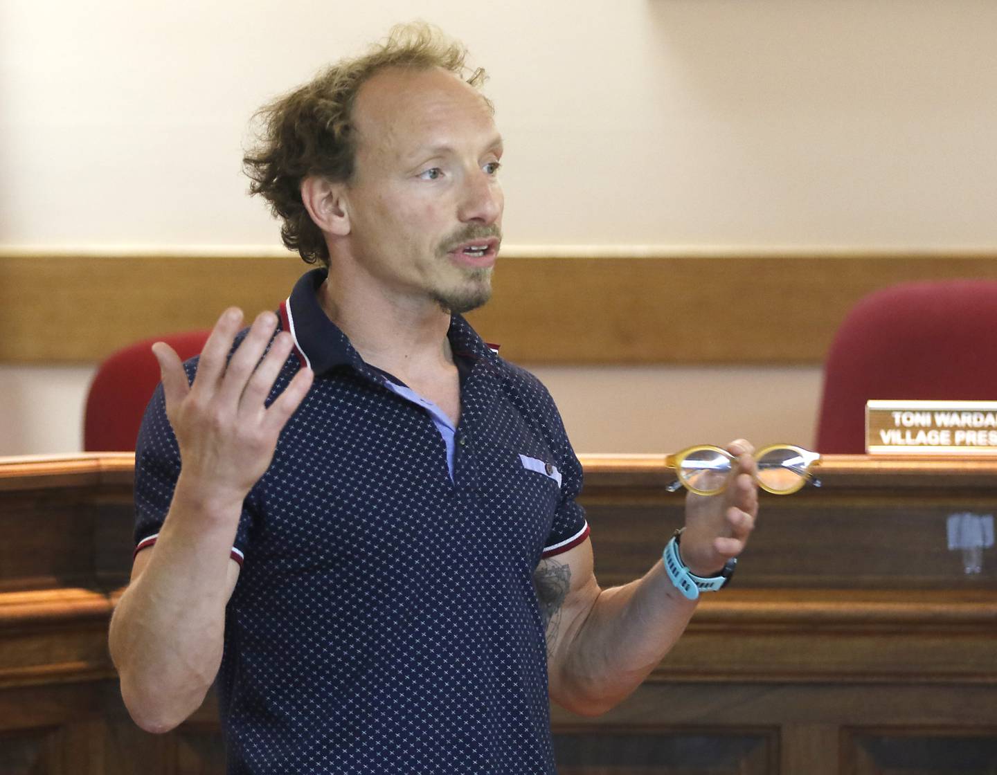 Zachary Zises, owner of 280E LLC, presents the plans for a proposed cannabis dispensary Thursday, Aug. 18, 2022, to a standing room only crowd attending a listening session at Richmond Village Hall. The proposal is set to be voted on by the Village Plan Commission at a meeting at 6 p.m. Monday, Aug. 22. Most the the residents at the listening session voiced their approval of the dispensary, but we opposed to the proposed location is at 5500 Swallow Ridge Drive, just off a busy stretch of Highway 12 just south of where Burlington Road branches off the highway.