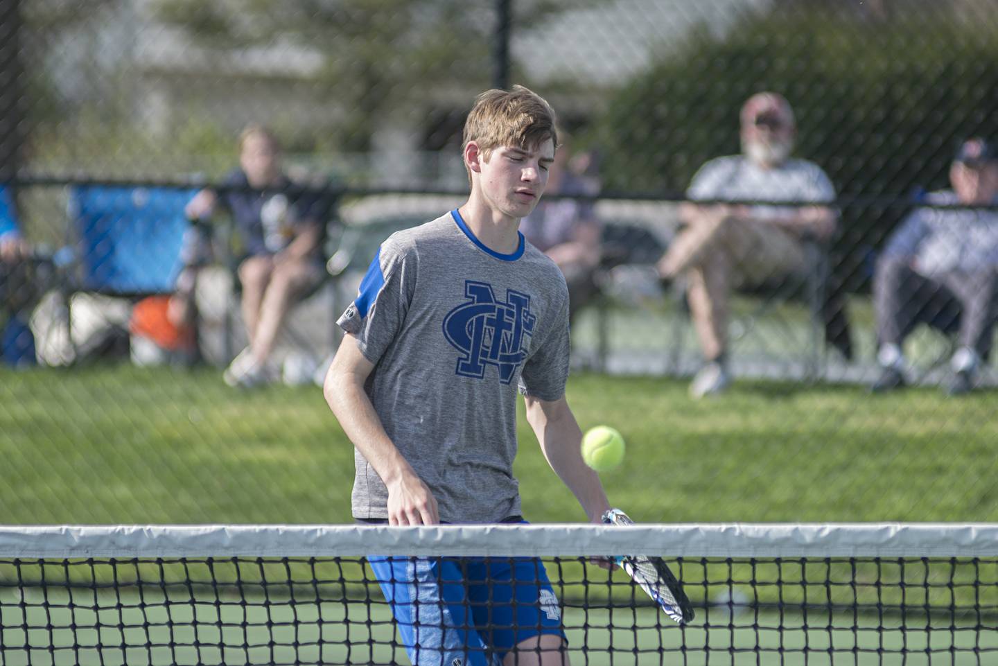 Newman’s Griffin Moran works the net against Sterling Monday, May 9, 2022. Moran and doubles partner James Rhodes faced off against Sterling’s Kayden Loos and Ben Boze.