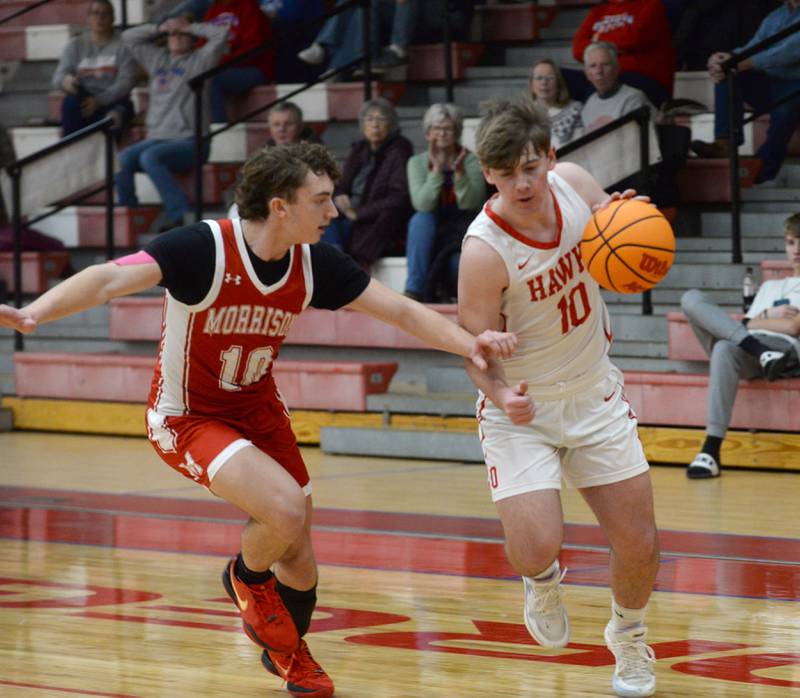 Oregon's Keaton Salsbury (10) dribbles up the sideline as Morrison's Colton Bielema (10) defends during a Saturday, Jan. 11, 2025 game at the Blackhawk Center in Oregon.