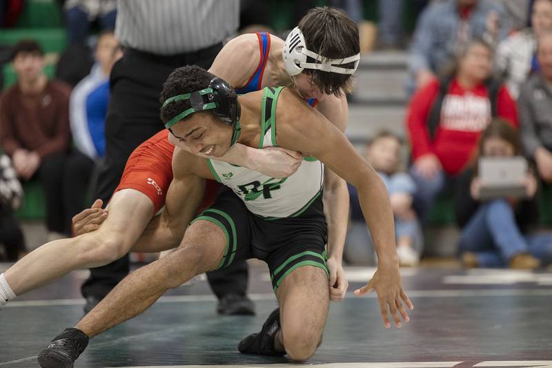 Rock Falls’ Adan Oquendo and Oregon’s Griffin Marlatt wrestle at 126 pounds Thursday, Jan. 19, 2023 in Rock Falls. Oquendo won by an injury default.
