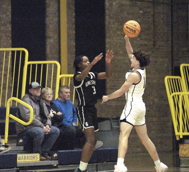 Warrior Nico Battaglia defends the basket against Galesburg's Keigen Cummer. Sterling Boys Basketball hosted Galesburg at Musgrove Fieldhouse on February 11, 2025.