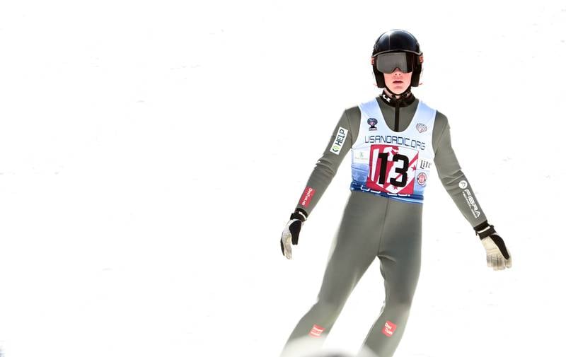Jacob Larson of St. Paul, Minnesota has completed the jump and reaches the fence line at the bottom of the ski jump at the Norge Ski Jump 121st Annual Winter Tournament on Feb. 1, 2026 at the Norge Ski Club, 100 Ski Hill Road, Fox River Grove.