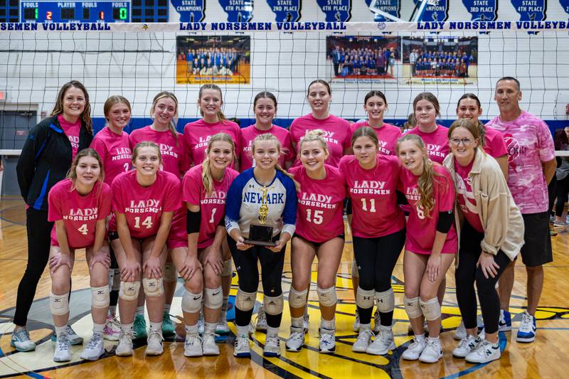 Newark’s volleyball team poses for picture after claiming 1st place in the little 10 conference tournament on Saturday, October 12, 2024 at Newark Community High School in Newark.