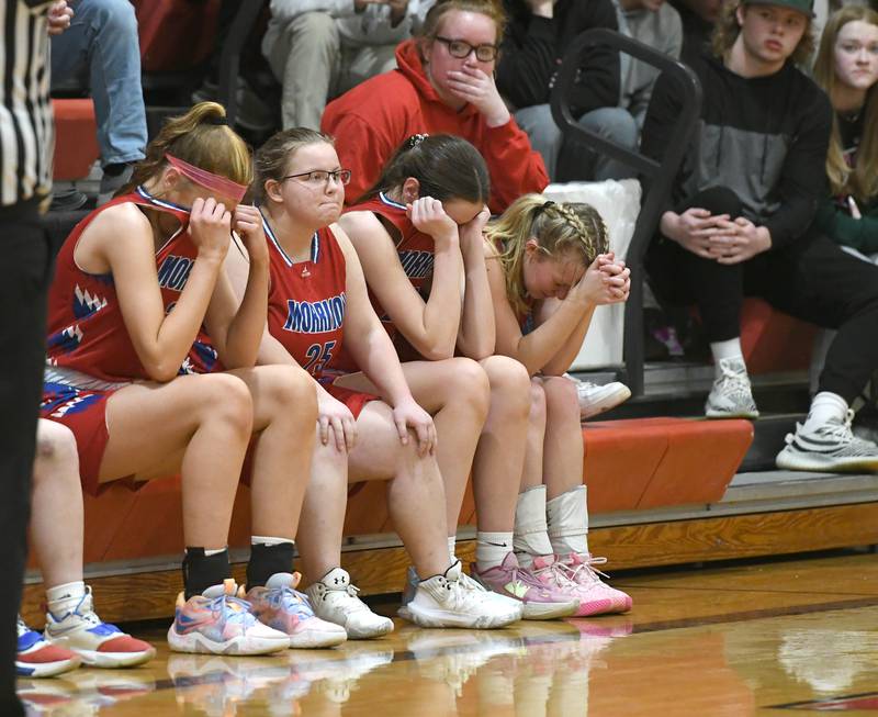 Morrison players react as they watch the final seconds of their 64-36 loss to Orangeville at the 1A Pearl City Regional on Friday. The Broncos  advance to the Polo Sectional.