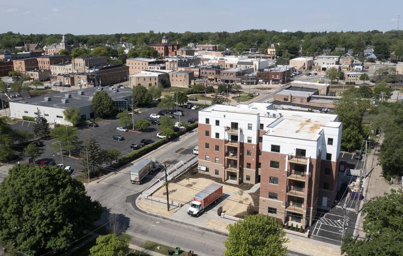 An aerial photo shows the proximity of the Historic Woodstock Square to the newly built Woodstock Square Apartments on Madison and Church streets in Woodstock. Residents began to move in this week to the 30-unit, five-story apartment complex.