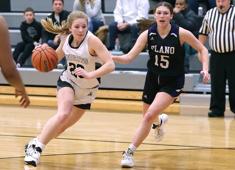 Kaneland’s Kendra Brown drives past Plano’s Alex Bishop during their game Tuesday, Dec. 13, 2022, at Kaneland High School in Maple Park.