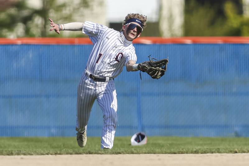 Oswego's Thomas Harazin (1) comes in with a running catch during baseball game Oswego East at Oswego.  May 14, 2026 in Oswego.