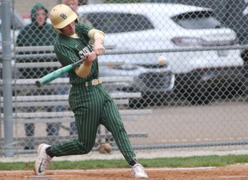St. Bede's Ryan Slingsby makes contact with the ball against Marquette at Masinelli Field on Thursday, April 18, 2024 in Ottawa.