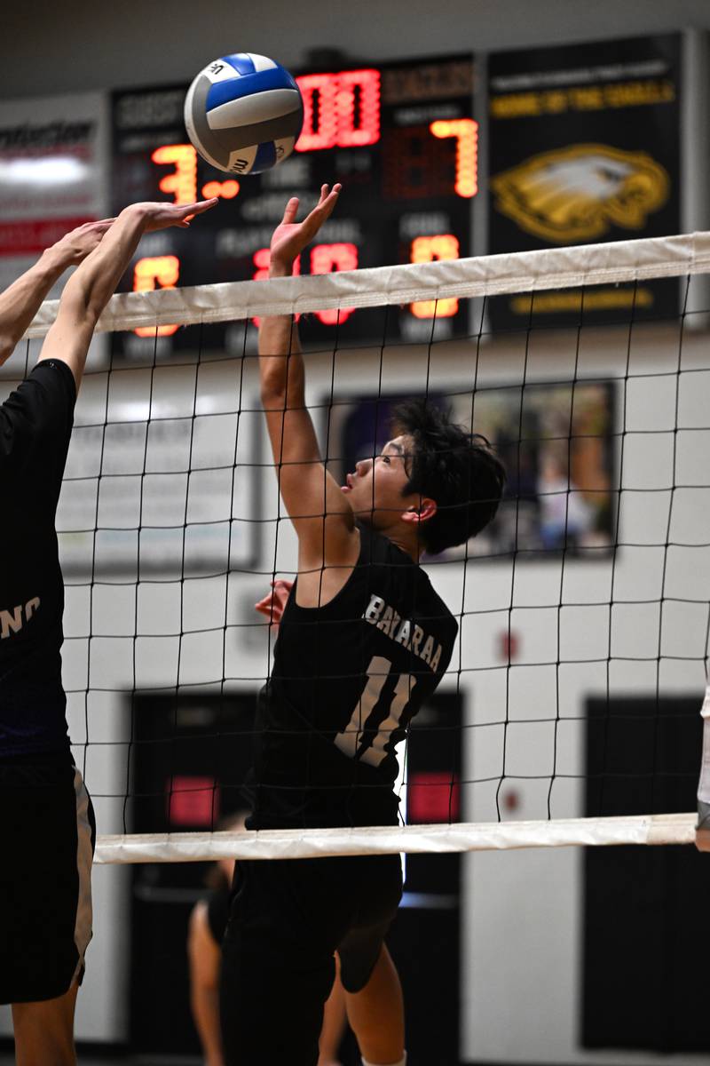Kankakee Trinity Academy's Johnny Bayaraa blocks the ball during the game against Manteno on Thursday, May 1, 2025.