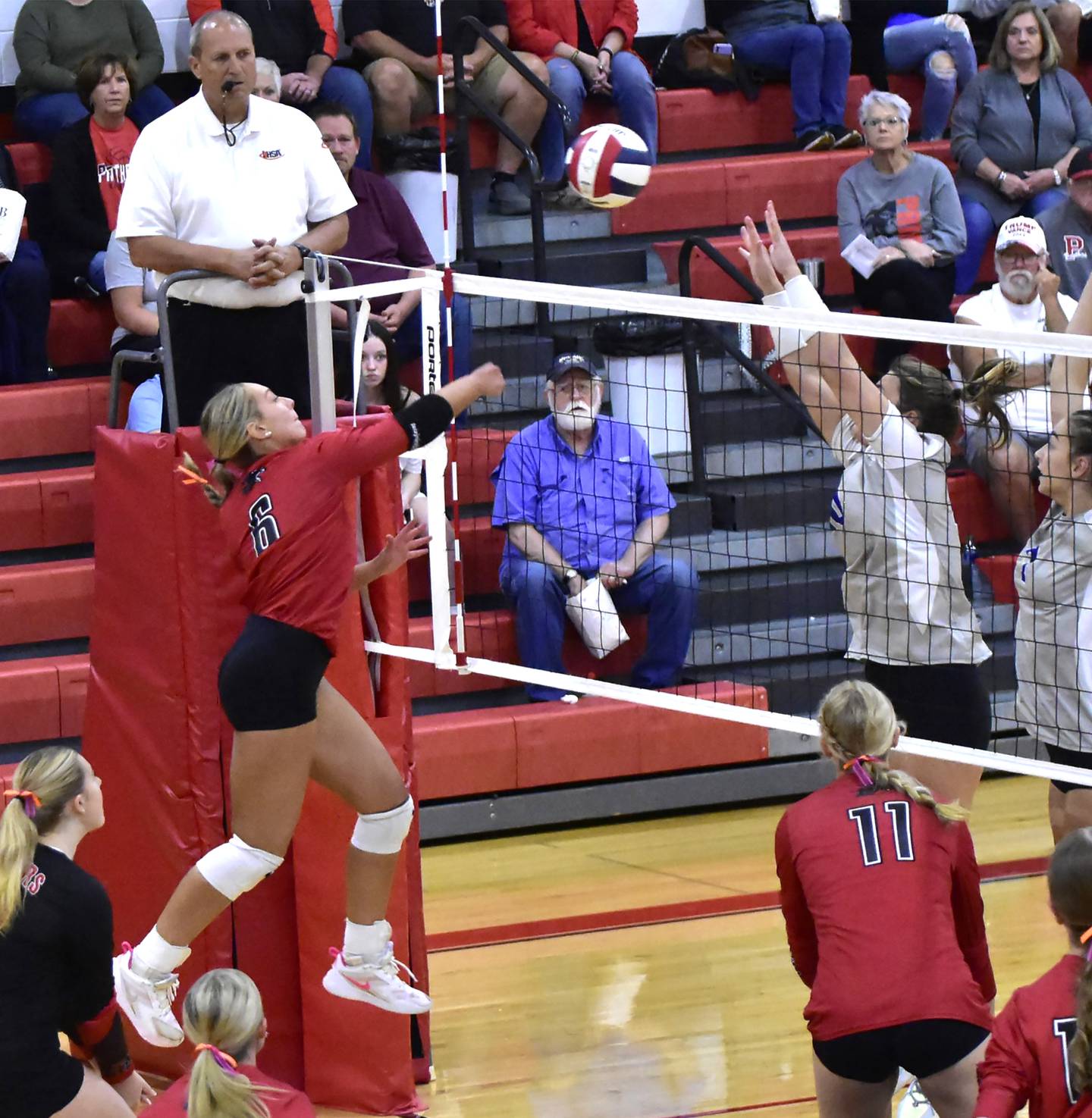 Erie-Prophetstown's Jamie Neumiller (6) records a kill against Princeton during a Sept. 24, 2024 match.