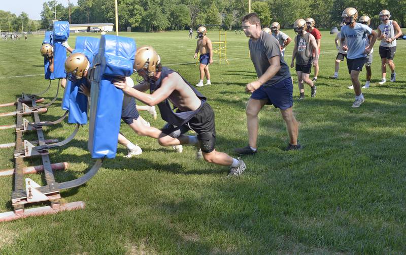 The Marquette Crusaders began their first practice Monday at the Gould Field complex with a variety of drills and workouts to prepare for the upcoming 2025 season.