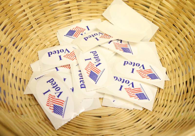 "I Voted" stickers lay in a basket at Zion United Church of Christ on Tuesday, April 4, 2023 in Peru.