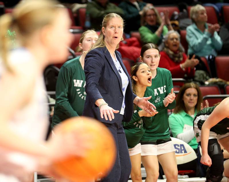 St. Edward head girls basketball coach Michelle Dawson coaches the Lady Wave against Cissna Park during the Class 1A third place game on Friday, March 7, 2025 at CEFCU Arena in Normal.