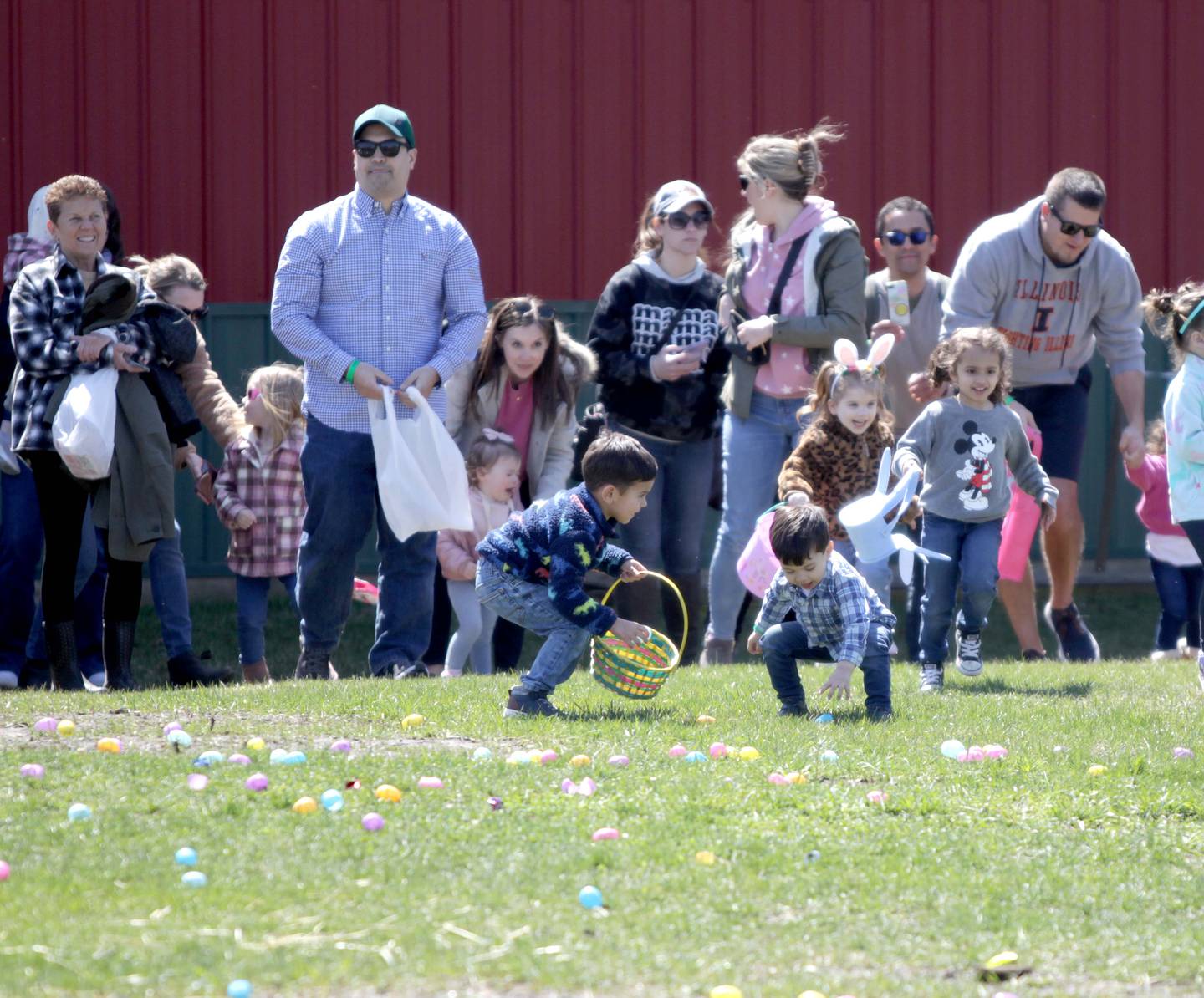 Young participants take off for an egg hunt at Windy Acres Farm in Geneva on Friday, April 7, 2023.
