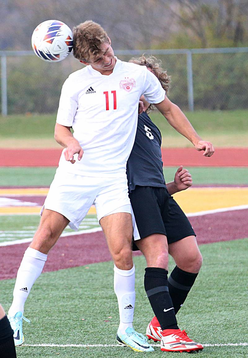 Timothy Christian's Caleb Hoekstra (11) cuts in front of Wheaton Academy's Scotty Murray (5) to beat him to a header during the Class 1A State soccer third place game on Saturday, Oct. 29, 2022 at EastSide Centre in Peoria.