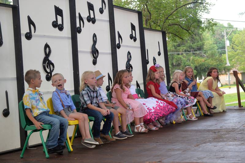 Contestants for German Valley Days' Little Miss and Mister contest wait during the start of the contest on Saturday, July 15, 2023. Pictured, left to right, are: Mason Taylor, 5; Jack Schoeny, 5; Mattix Leombruni, 5; Lincoln Dietrich, 5; Addison Wilken, 6; Harper Smice, 6; McKinley Schopf, 5; Kennedy Schopf, 7; Lenora Schniederman; Isabella Gentry, 7; Elyse Garnhart, 8; andAaliyah Espinosa, 7.