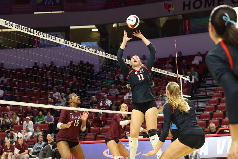 Benet Academy's Ellie Stiernagle sets up the ball during Benet Academy's victory in two sets, 25-23, 25-16, over Lockport in the IHSA Class 4A State semifinals on Friday, Nov. 14, 2025.
