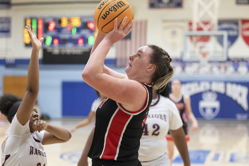 Amboy’s Emily Sachs puts up a jumper against Morgan Park Academy Tuesday, Feb. 25, 2025, in the Class 1A Sectional semifinal at Hinckley-Big Rock.