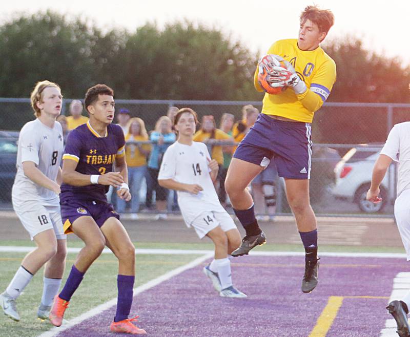 Bloomington Central Catholic keeper Auston Koch blocks a kick from Mendota's Rafael Romero (3) on Wednesday, Sept. 14, 2022 in Mendota.