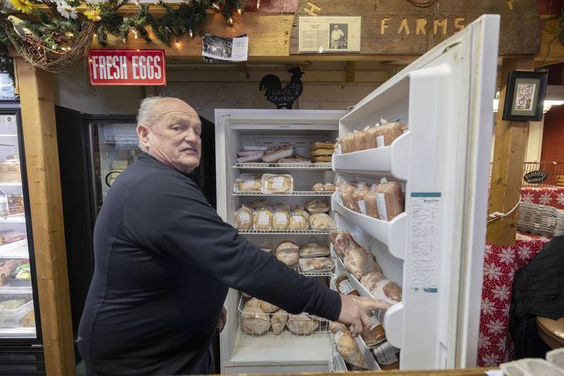 Joe Reaver of Hollyhock Hill Farms of Sterling showcases a display of meats and cheeses which is for sale at the Twin City Farmers Market. The market is open on Saturdays from 8 to noon.