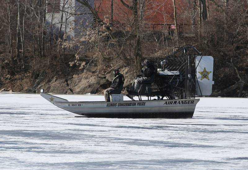 Conservation Police officers glide on top of ice during a training mission on Monday, Jan. 27, 2025 along the Fox River in Ottawa.