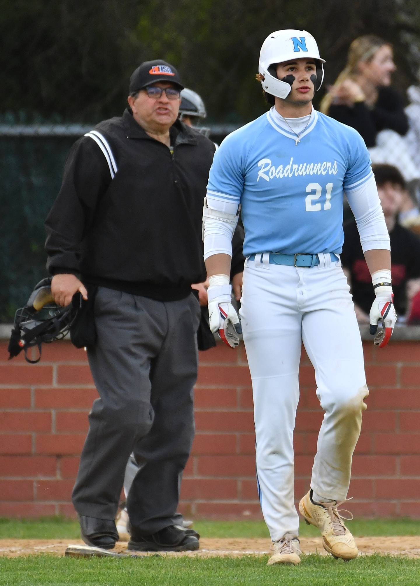Nazareth's Jaden Fauske starts slowly towards first base as he watches his second home run sail deep into the parking lot well beyond the right field fence during a game against Benet on April 22, 2024 at Benet Academy in Lisle.