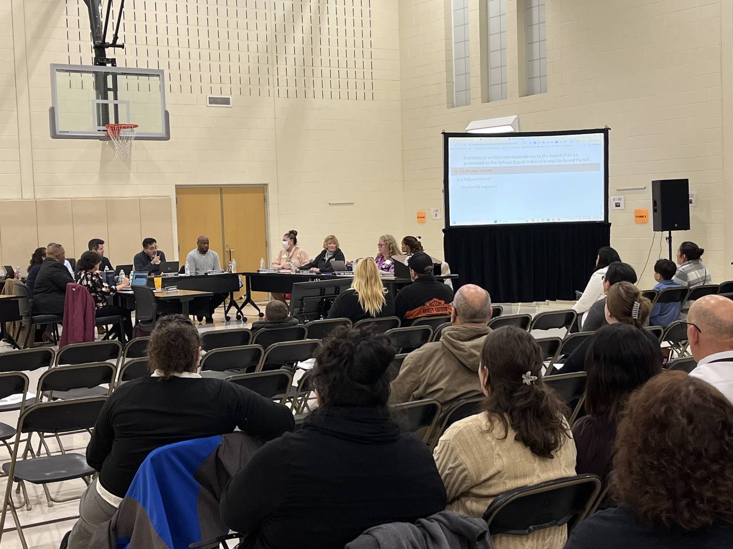 Attendees at a public hearing for the proposed closure of A.O. Marshall Elementary School on Thursday, Jan. 8, 2026, at Isaac Singleton Elementary School in Joliet.