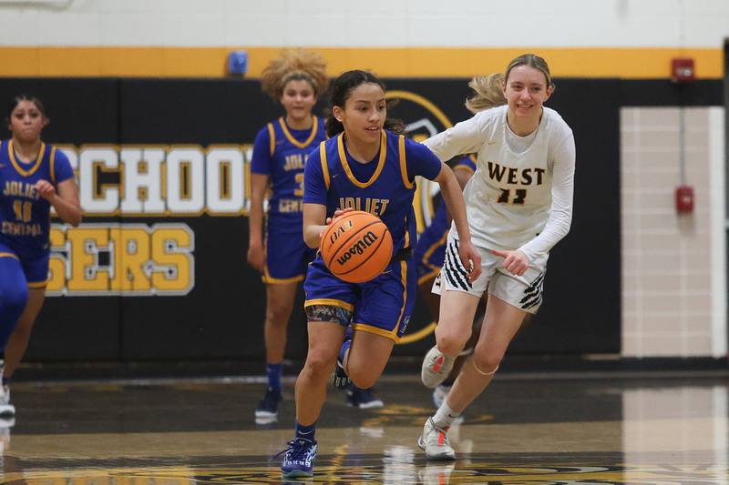 Joliet Central’s Elena Moody head upcourt with the steal against Joliet West on Thursday, Jan 30, 2025 in Joliet.