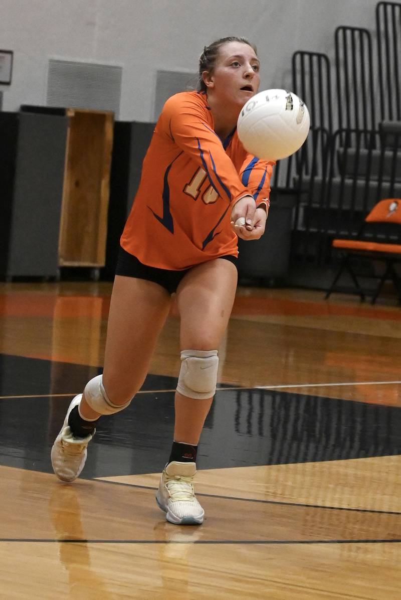 Genoa’s Alayna Pierce collects a shot during a sectional final against Rock Falls. GK won in two sets.