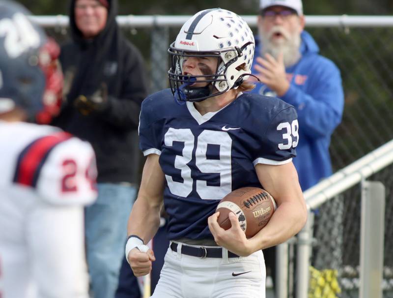 Cary-Grove’s Holden Boone celebrates an early touchdown against Belvidere North in IHSA Class 6A quarterfinal playoff football action on Saturday, Nov. 16, 2024, at Al Bohrer Field on the campus of Cary-Grove High School in Cary.