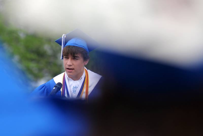 Jacob John Murray speaks Sunday, May 15, 2022, during the Woodstock High School graduation ceremony in Woodstock.