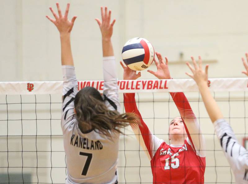 L-P's Drew Depenbrock sends the ball over the net past Kaneland's Brielle Gadomski on Tuesday, Oct. 7, 2025 in Sellett Gymnasium at L-P High School.
