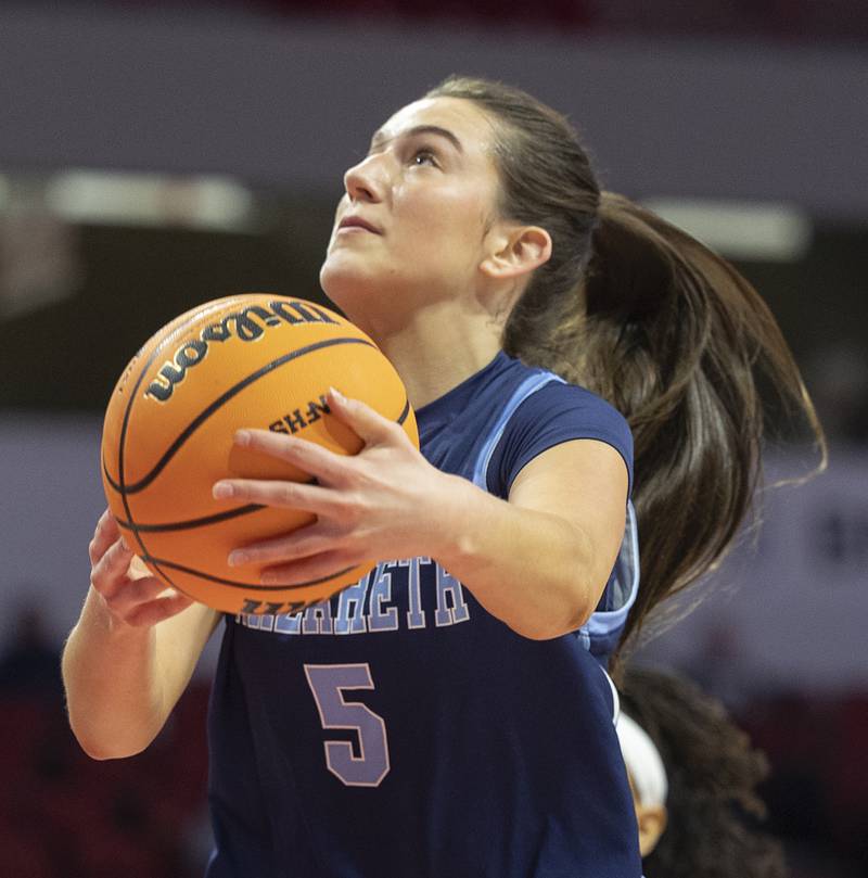 Nazareth's Sophia Towne scoops up a shot against Belleville East Friday, March 6, 2026, in the Class 4A girls state semifinal game at CEFCU Arena at ISU.