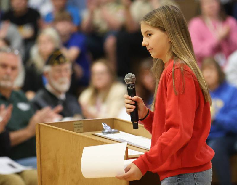 Logan Jr. High student Lena Gutshall, during the Veterans Day program on Friday, Nov. 7, 2025 at Logan Jr. High in Princeton .