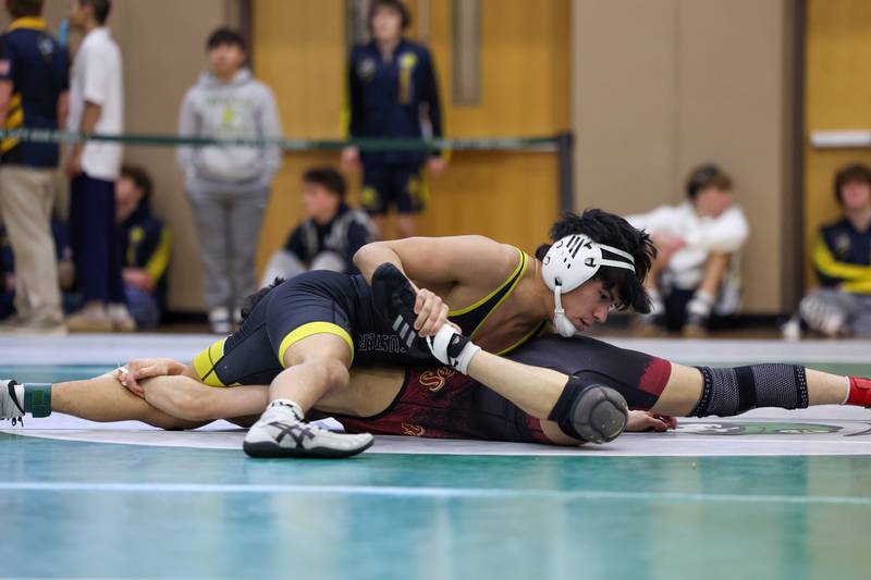 Reed-Custer's Jayden Sanchez wrestles Westmont's Ardan Baglaev in the 132-pound third place match during the IHSA Class 1A Coal City Sectional on Saturday, Feb. 14, 2026.