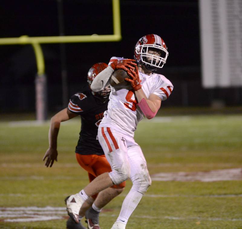Morrison's Levi Milder (9) catches a pass against Fulton on Friday, Oct. 25, 2024 in Fulton.