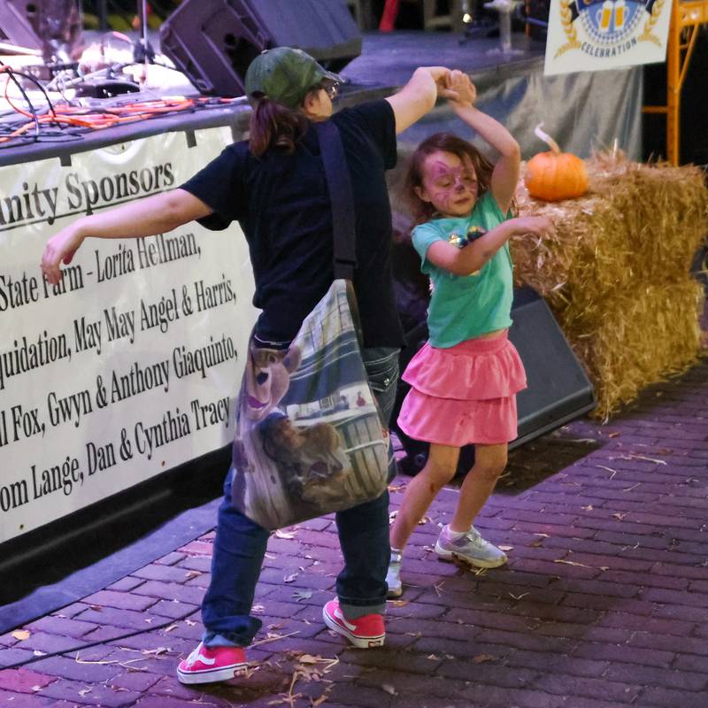 People of Princeton dance in front of stage on Saturday, October 5, 2024 at Rotary Park in Princeton.