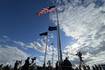 Raynor ceremoniously raises giant American flag above Dixon facility 