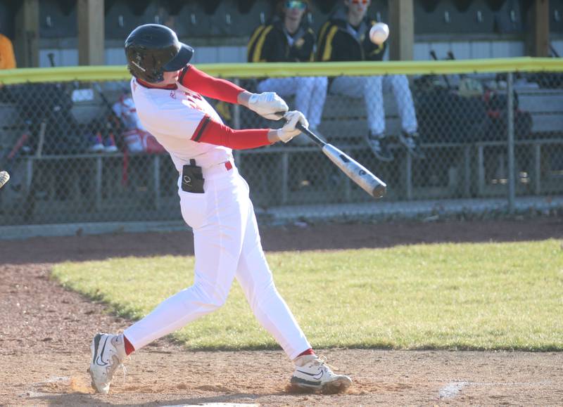 Hall's Geno Ferrari makes contact with the ball against Putnam County on Monday, March 17, 2025 at Putnam County High School.