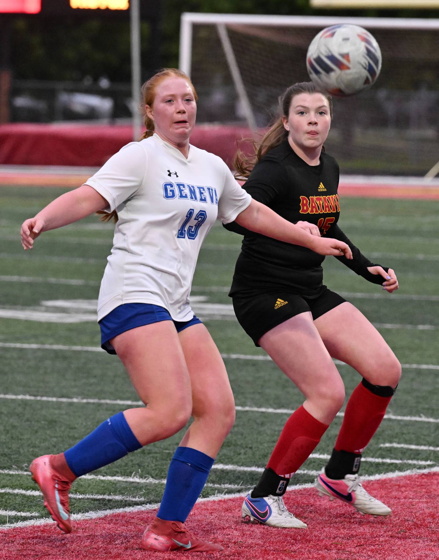 The ball bounces in front of Geneva’s Claire Reeve, left, and Batavia’s Samantha Donahue during Tri-Cities soccer night on Tuesday, May 5, 2026 in Batavia.