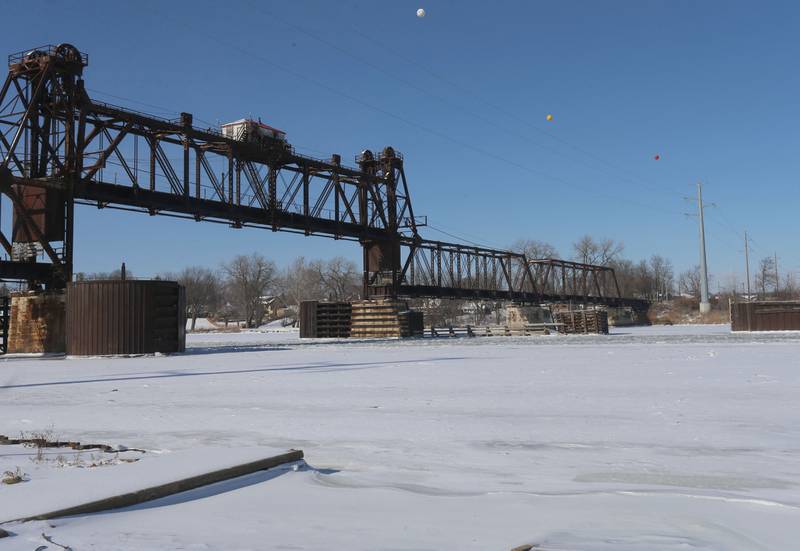 The Illinois River freezes over underneath the Ottawa Rail Bridge on Monday, Jan. 26, 2026 in Ottawa.