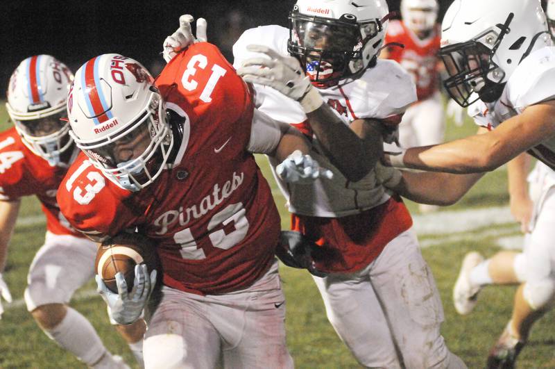 Ottawa's Ryder Miller (13) is tackled by Streator's Isaiah Brown at King Field on Friday, Sept. 1, 2023.