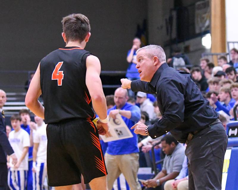 Wheaton Warrenville South's head coach Mike Healy looks on during the game on Friday Feb. 6, 2026; while taking on Wheaton North held at Wheaton Warrenville South High School.