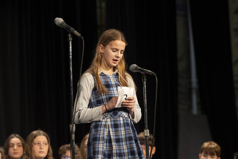 St. Anne’s 5th grader Anna Partington competes Thursday, Feb. 21, 2024 at the Lee-Ogle-Whiteside regional spelling bee. Partington missed the word “astonish” in round one.
