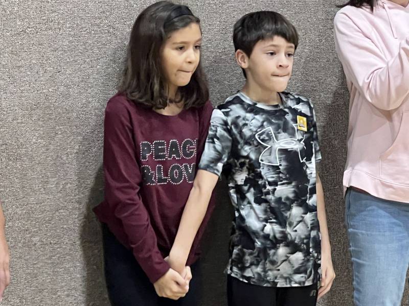 Joseph and Sedonia Dickens of Yorkville anxiously watch their family’s bridge being tested at the 2023 Bridge Bust with 4-H at Parkview Christian School.