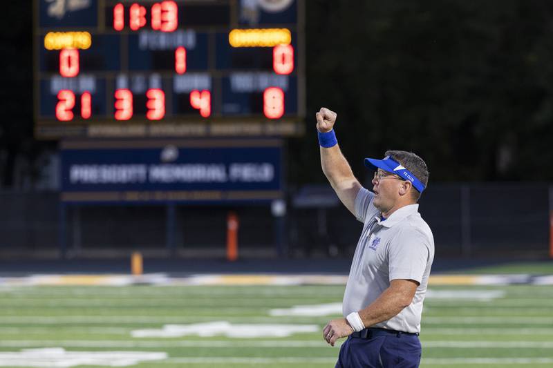 Newman special teams coach Todd Messer works the sidelines Friday, Sept. 20, 2024, at Roscoe Eades Stadium in Sterling.